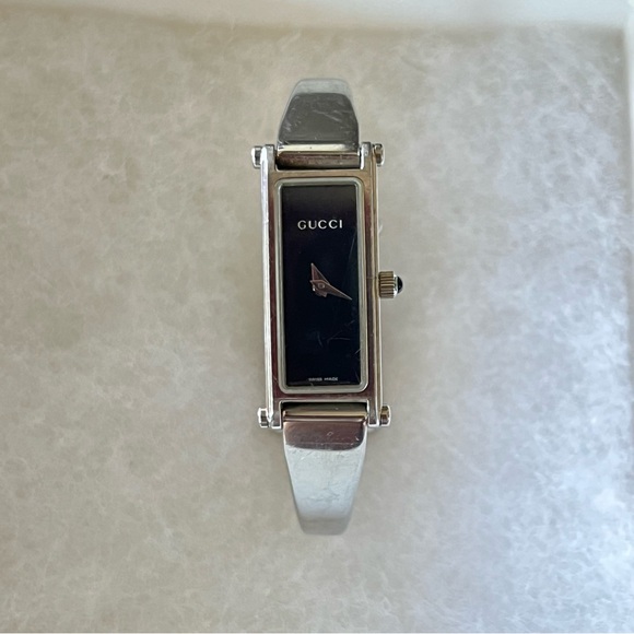 Gucci Accessories - Vintage Gucci Silver Bangle Watch with Black Dial (EUC)